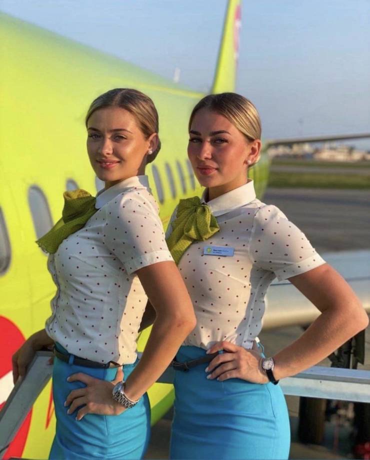 Hot Flight Attendants With And Without Their Uniforms