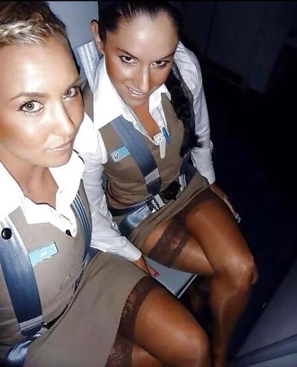 Wanna Fly With These Sexy Flight Attendants?