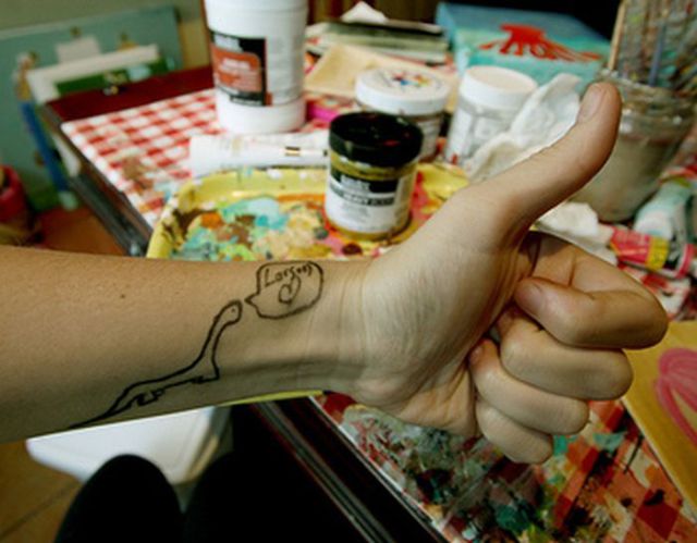 Horrible Self-made Tattoos