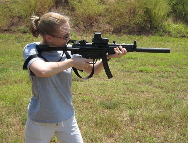 Cute Girls and Guns Go Well Together