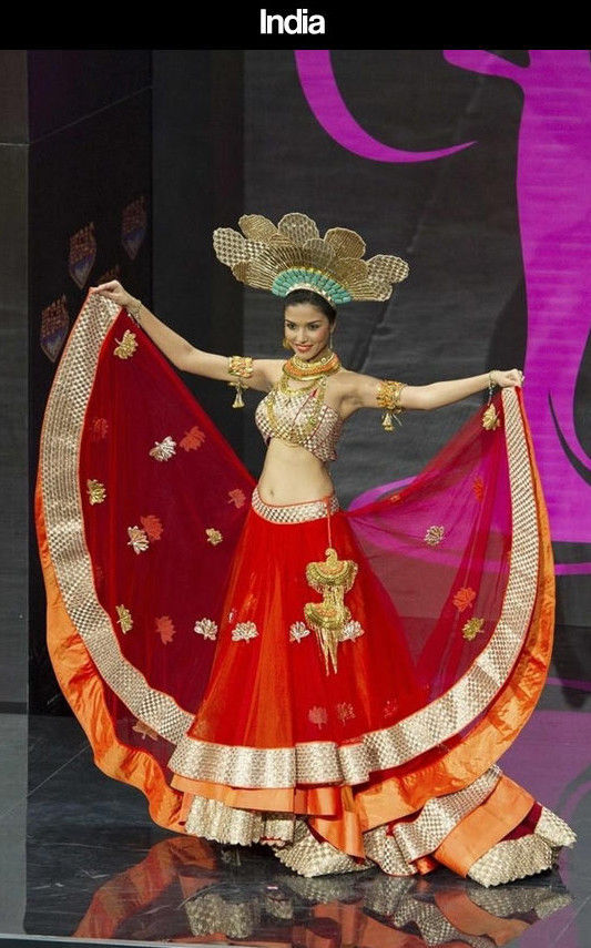 Miss Universe Pageant Contestants Parade Costumes for Their Country