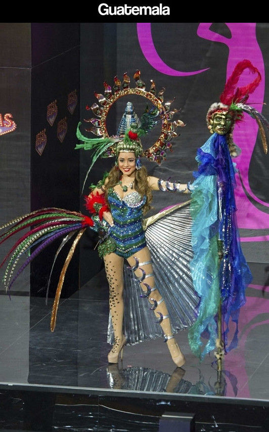 Miss Universe Pageant Contestants Parade Costumes for Their Country