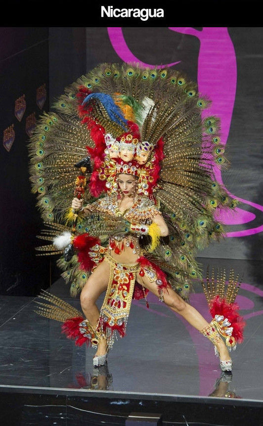 Miss Universe Pageant Contestants Parade Costumes for Their Country