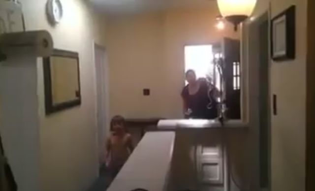 Dad and Son Fire Toilet Paper Cannon at Mom